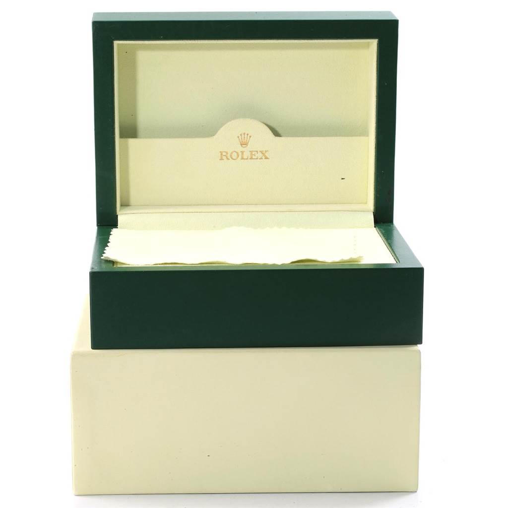 The image shows an open Rolex Submariner 16610 Men
s Stainless Steel Black Dial 16610 Men
s Stainless Steel Black Dial watch box with the Rolex logo inside.