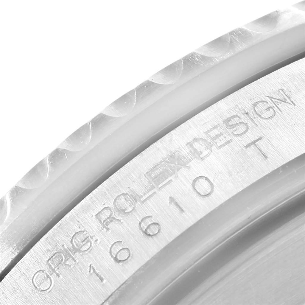 This image shows a close-up of the case side engraving on a Rolex Submariner 16610 Men
s Stainless Steel Black Dial 16610 Men
s Stainless Steel Black Dial model watch, highlighting the model number and design text.