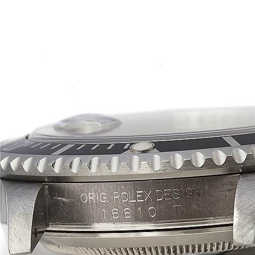 This is a close-up side view of a Rolex Submariner 16610 Men's Stainless Steel Black Dial 16610 Men's Stainless Steel Black Dial, showing the bezel and the engraving on the case.