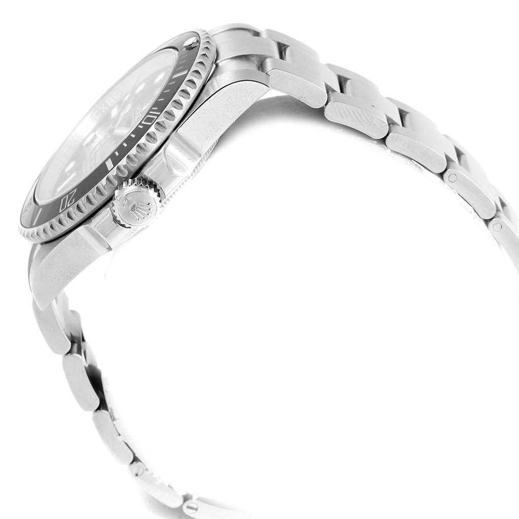The image shows a side view of the Rolex Submariner 114060 Men
s Stainless Steel Black Dial 114060 Men
s Stainless Steel Black Dial watch, highlighting its crown, bezel, and bracelet.