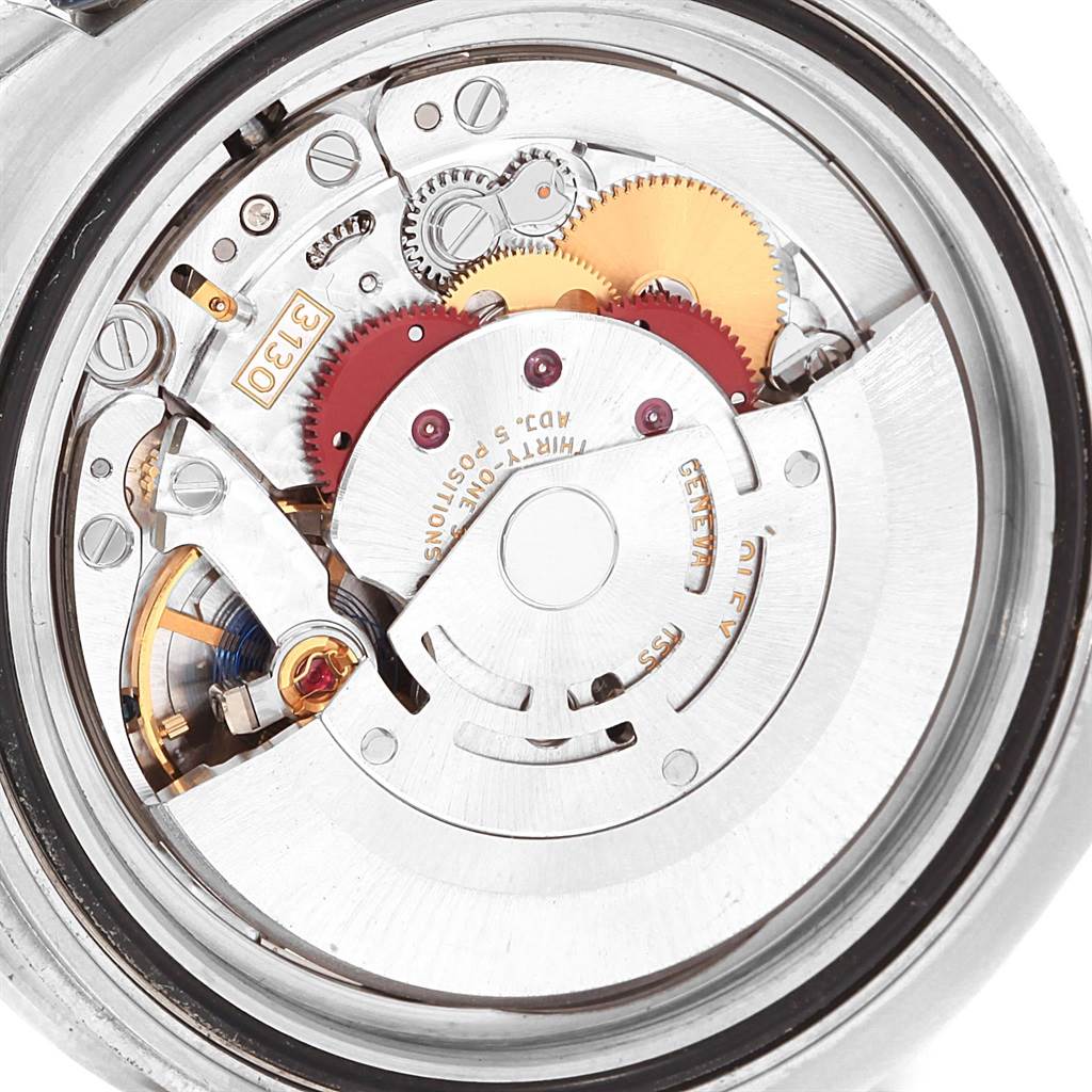 This image shows the internal mechanical movement of a Rolex Submariner 114060 Men
s Stainless Steel Black Dial 114060 Men
s Stainless Steel Black Dial watch from a back angle.