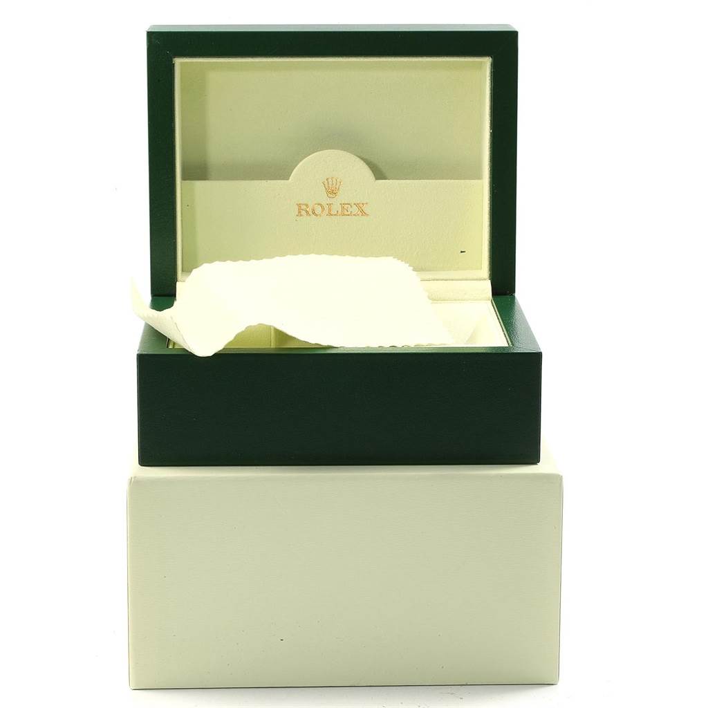 The image shows an open green and cream Rolex Submariner 16613 Men
s Steel and Gold (two tone) Champagne Dial 16613 Men
s Steel and Gold (two tone) Champagne Dial watch box with a cloth inside, viewed from the front.