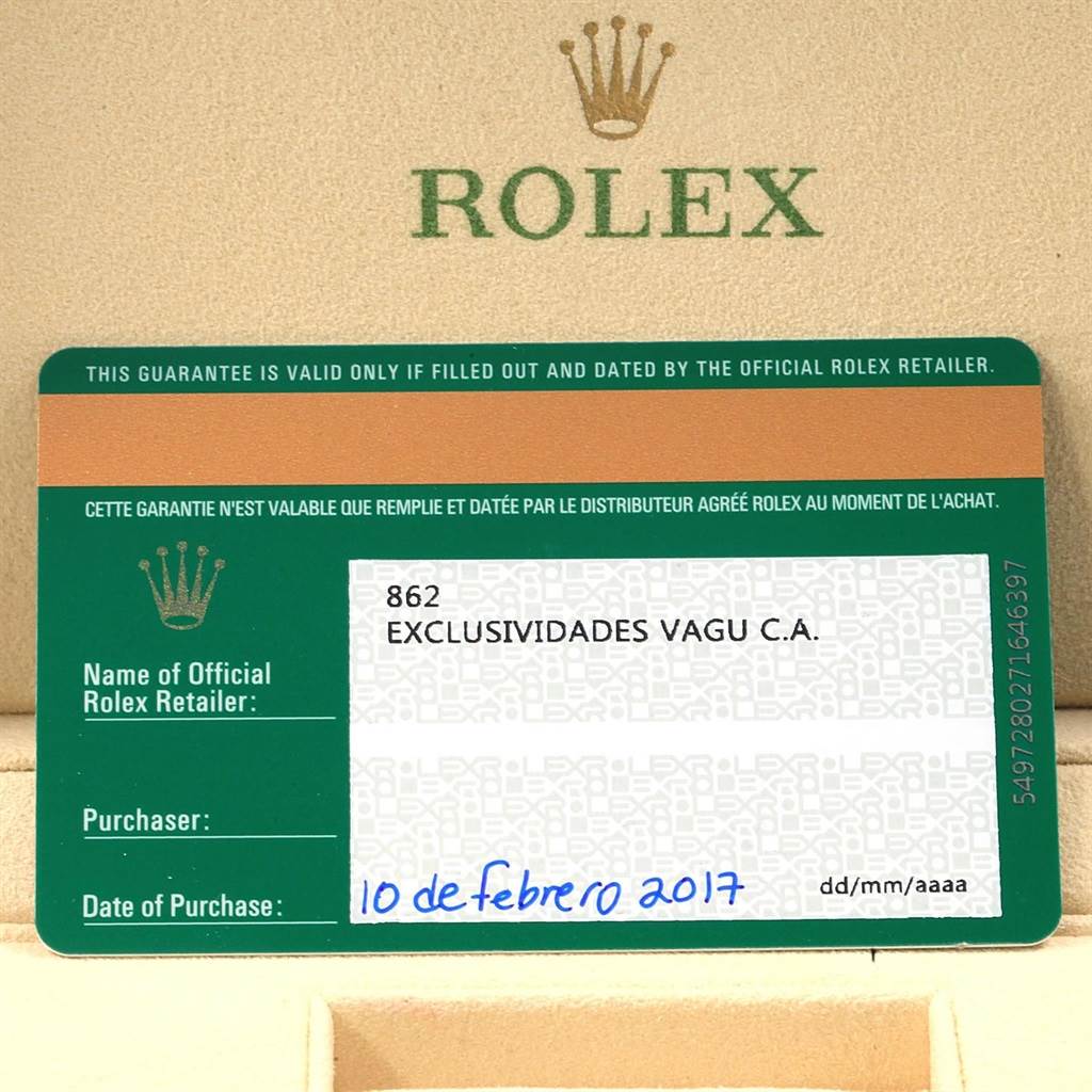 The image shows the warranty card of a Rolex Submariner 116610LV Men
s Stainless Steel Green Dial 116610LV Men
s Stainless Steel Green Dial watch, including the retailer
s name and date of purchase.