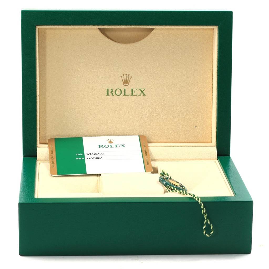 The image shows a green Rolex Submariner 116610LV Men
s Stainless Steel Green Dial 116610LV Men
s Stainless Steel Green Dial watch box with an open lid, an Best Quality
ation card, and a green and white tag inside.