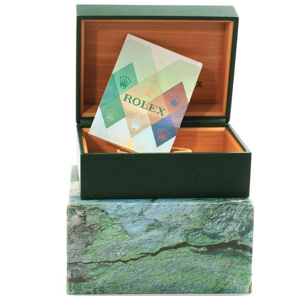 The image shows the box and warranty card for a Rolex Submariner 16613 Men's Steel and Gold (two tone) Black Dial 16613 Men's Steel and Gold (two tone) Black Dial watch, viewed from the front.