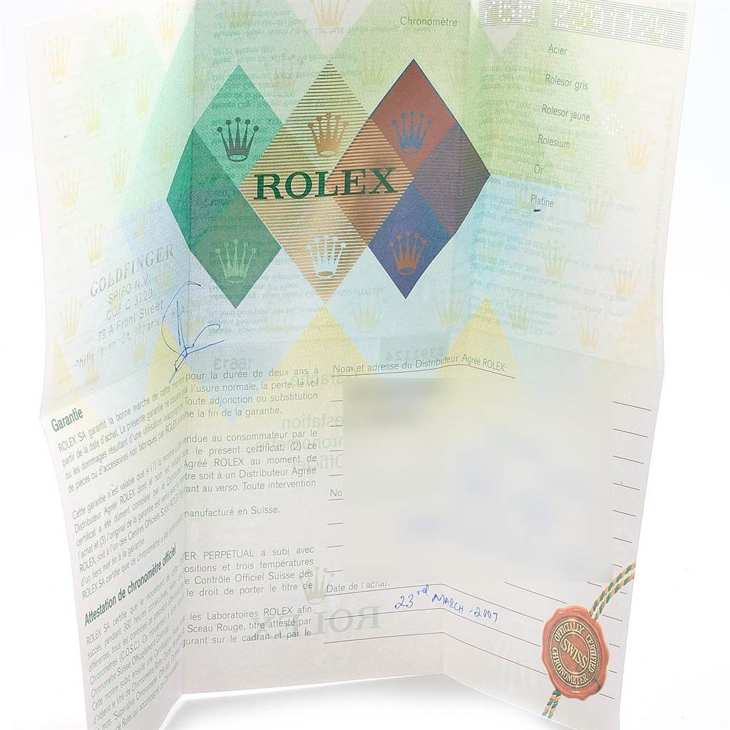 This image shows the warranty certificate for the Rolex Submariner 16613 Men's Steel and Gold (two tone) Black Dial 16613 Men's Steel and Gold (two tone) Black Dial, featuring the brand's logo and official details.
