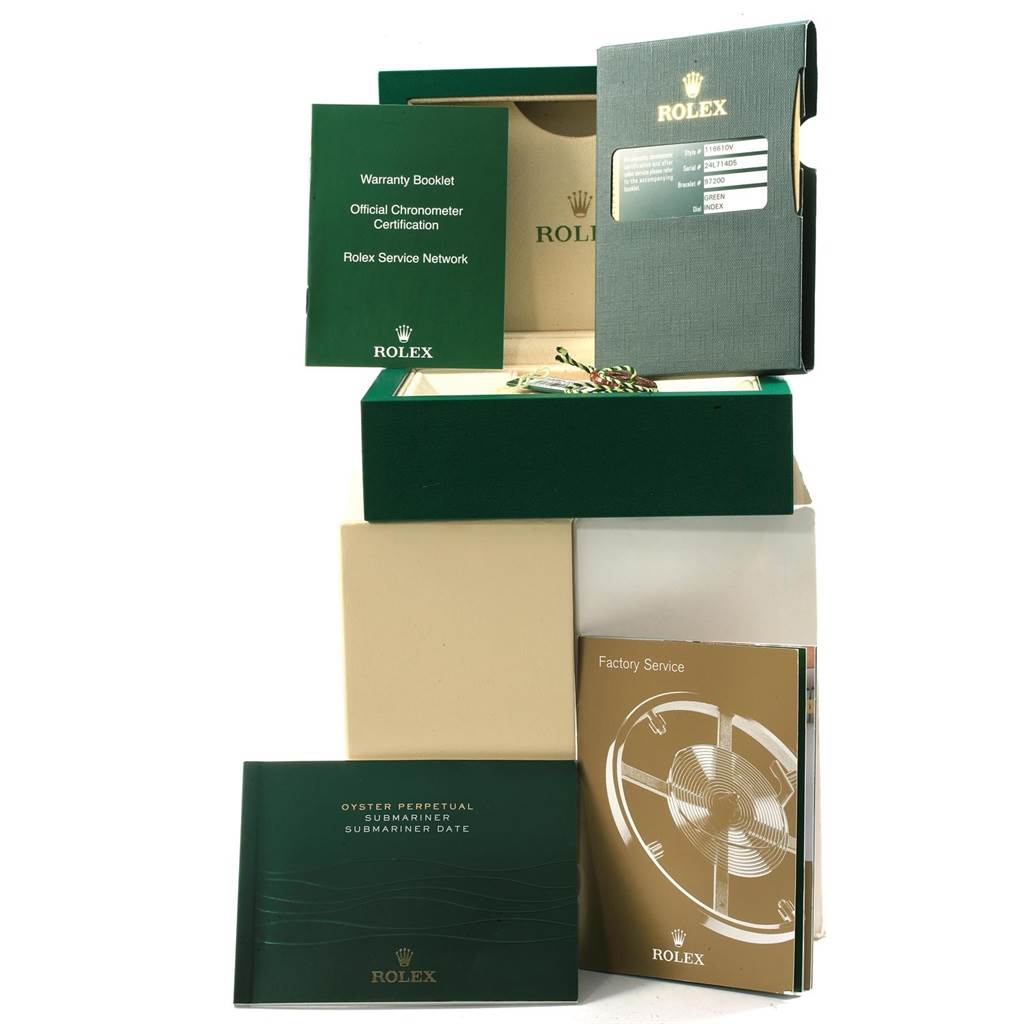 The image shows a collection of accessories and documents for a Rolex Submariner 116610LV Men's Stainless Steel Green Dial 116610LV Men's Stainless Steel Green Dial, including booklets, a warranty card, and packaging.