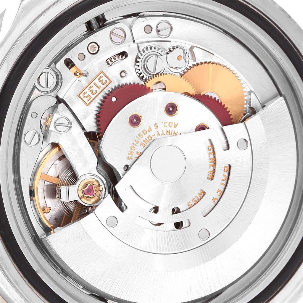 This image shows the internal mechanism and movement of the Rolex Submariner 16610 Men
s Stainless Steel Black Dial 16610 Men
s Stainless Steel Black Dial watch from a rear angle.