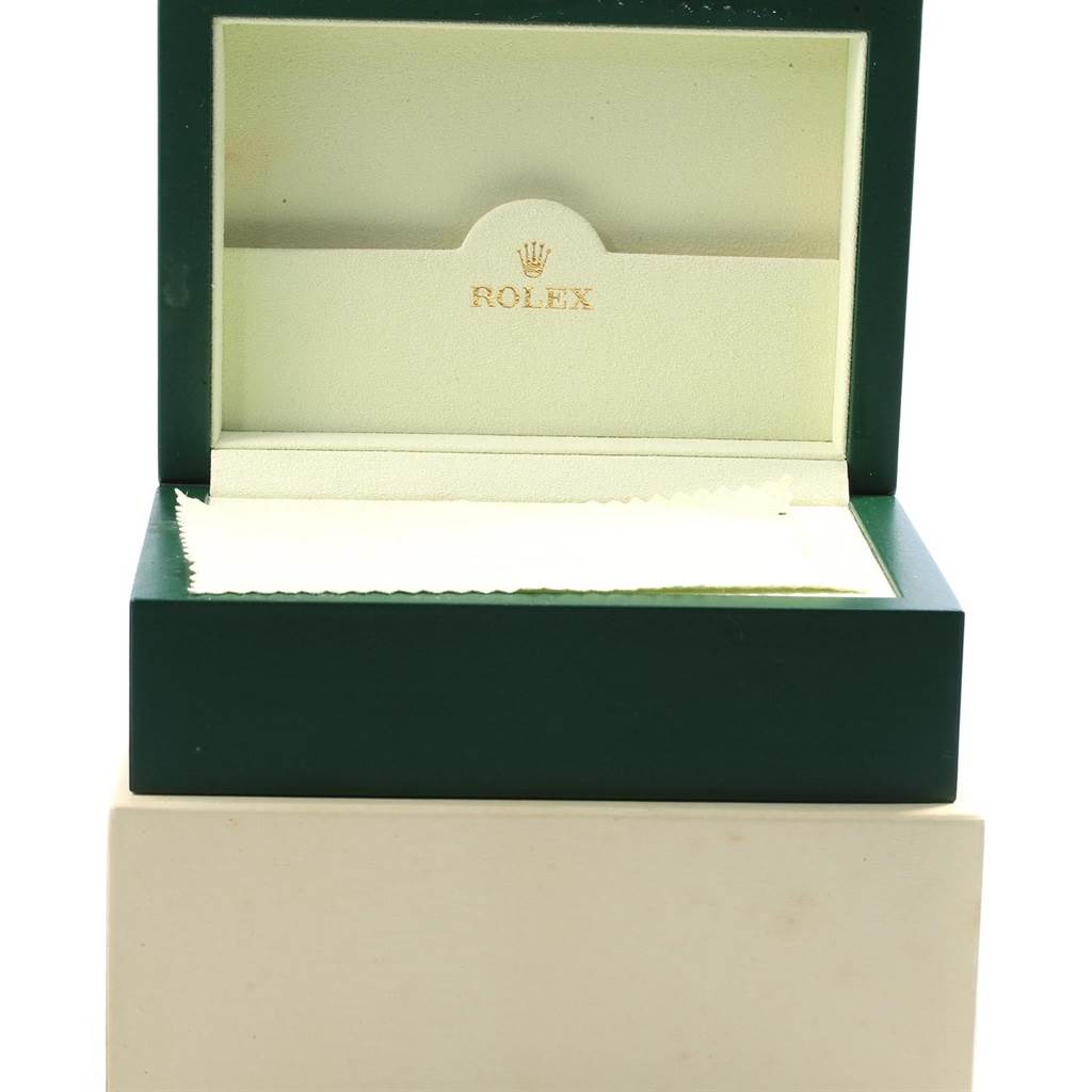 This image shows an open Rolex Submariner 16610 Men
s Stainless Steel Black Dial 16610 Men
s Stainless Steel Black Dial watch box from a front angle, displaying the interior with the Rolex logo.