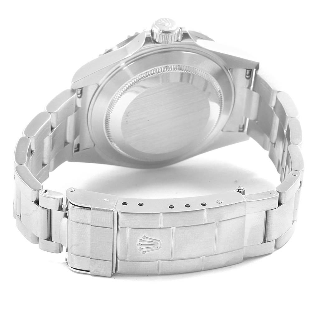 The image shows the back view of a Rolex Submariner 16610 Men
s Stainless Steel Black Dial 16610 Men
s Stainless Steel Black Dial watch, highlighting its case, bracelet, clasp, and crown.