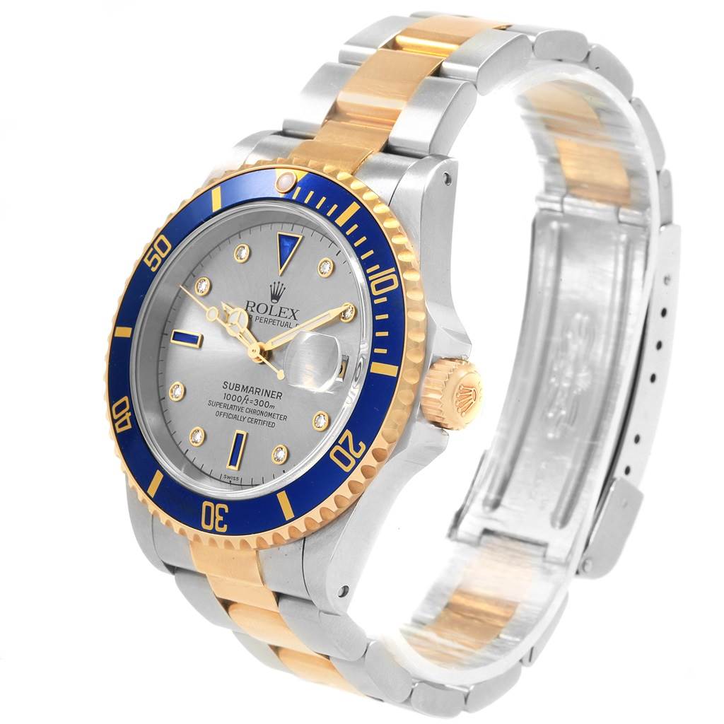 The image shows a side and frontal view of the Rolex Submariner 16613 Men's Steel and Gold (two tone) Grey Dial 16613 Men's Steel and Gold (two tone) Grey Dial watch, highlighting its bezel, dial, crown, and bracelet.