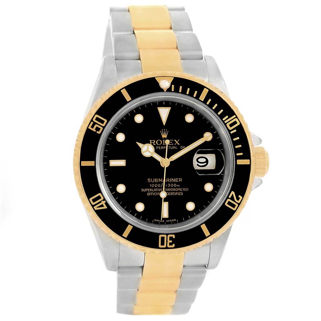 The Rolex Submariner 16613 Men's Steel and Gold (two tone) Black Dial 16613 Men's Steel and Gold (two tone) Black Dial watch is shown from a front angle, displaying its black dial, two-tone metal band, and date magnifier.