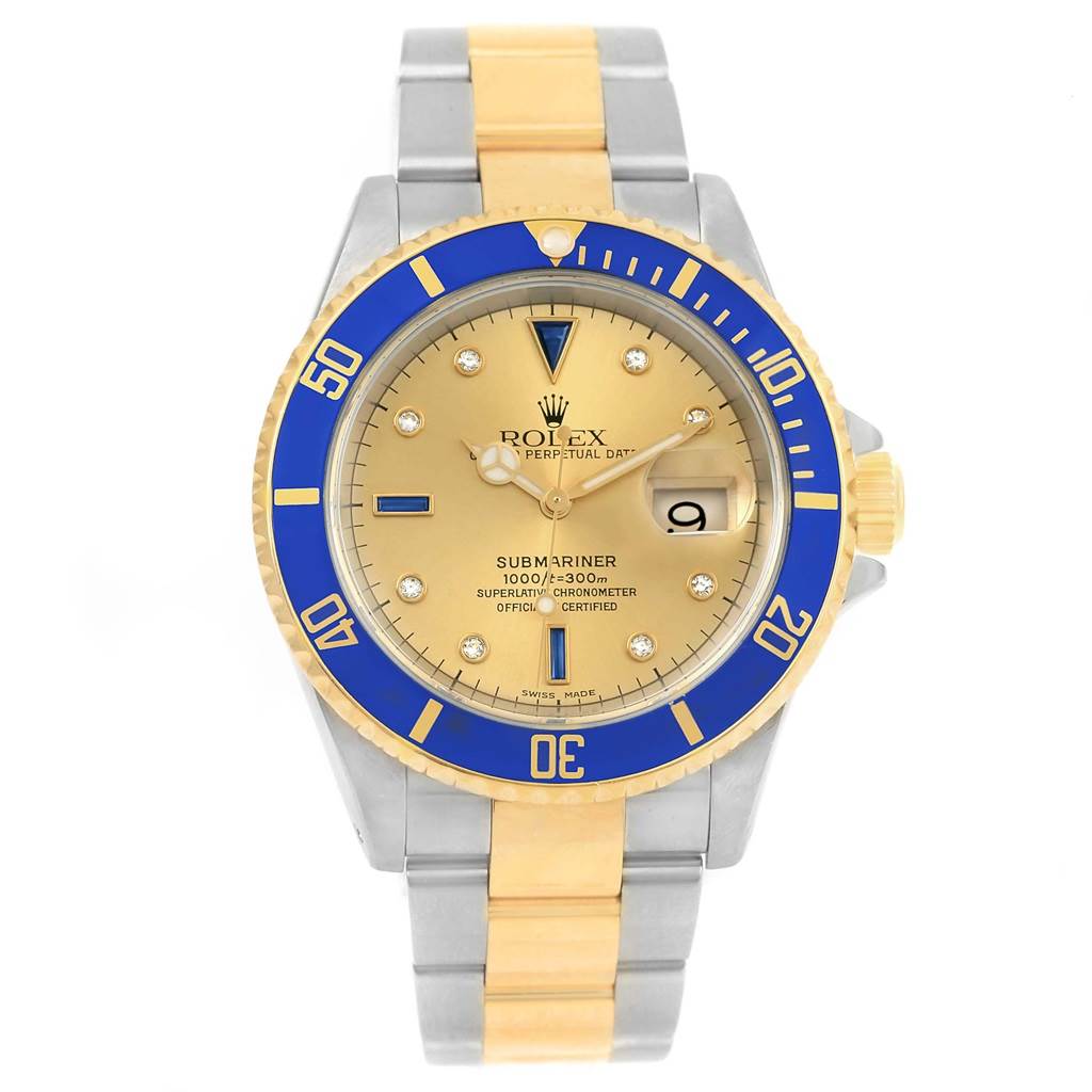 The image shows a Rolex Submariner 16613 Men's Steel and Gold (two tone) Champagne Dial 16613 Men's Steel and Gold (two tone) Champagne Dial watch with a gold and blue bezel, gold dial, and bi-metal bracelet, viewed from the front.