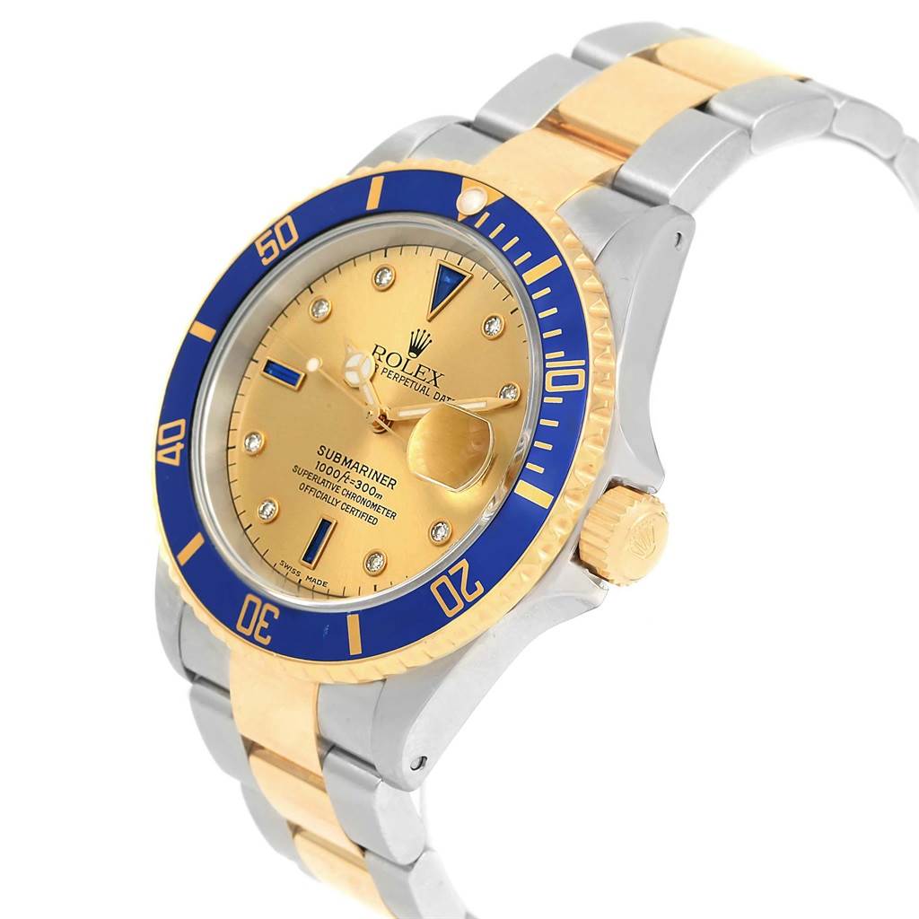 This image shows a Rolex Submariner 16613 Men's Steel and Gold (two tone) Champagne Dial 16613 Men's Steel and Gold (two tone) Champagne Dial watch at a three-quarter angle, highlighting its gold and silver bracelet, bezel, and crown.