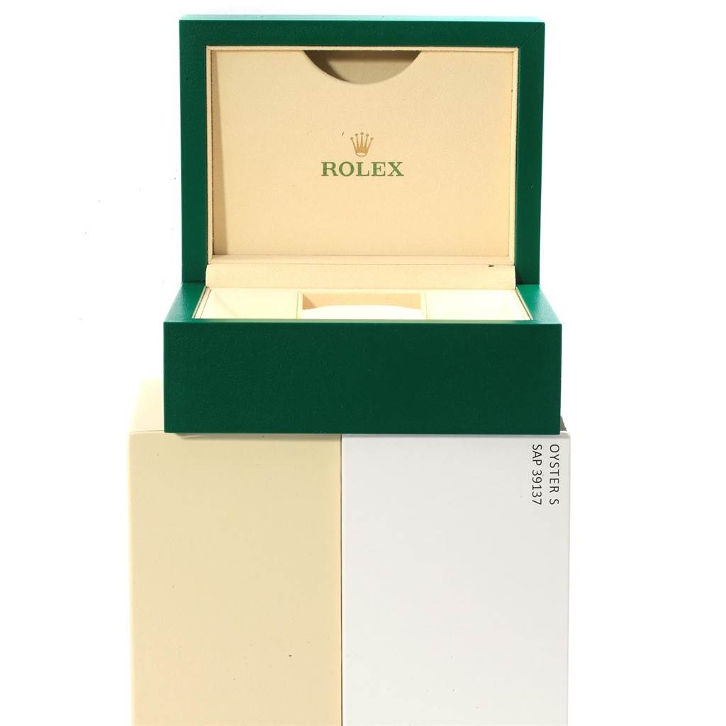 The image shows an open Rolex Submariner 116613 Men's Steel and Gold (two tone) Blue Dial 116613 Men's Steel and Gold (two tone) Blue Dial watch box, displaying the inner compartment.