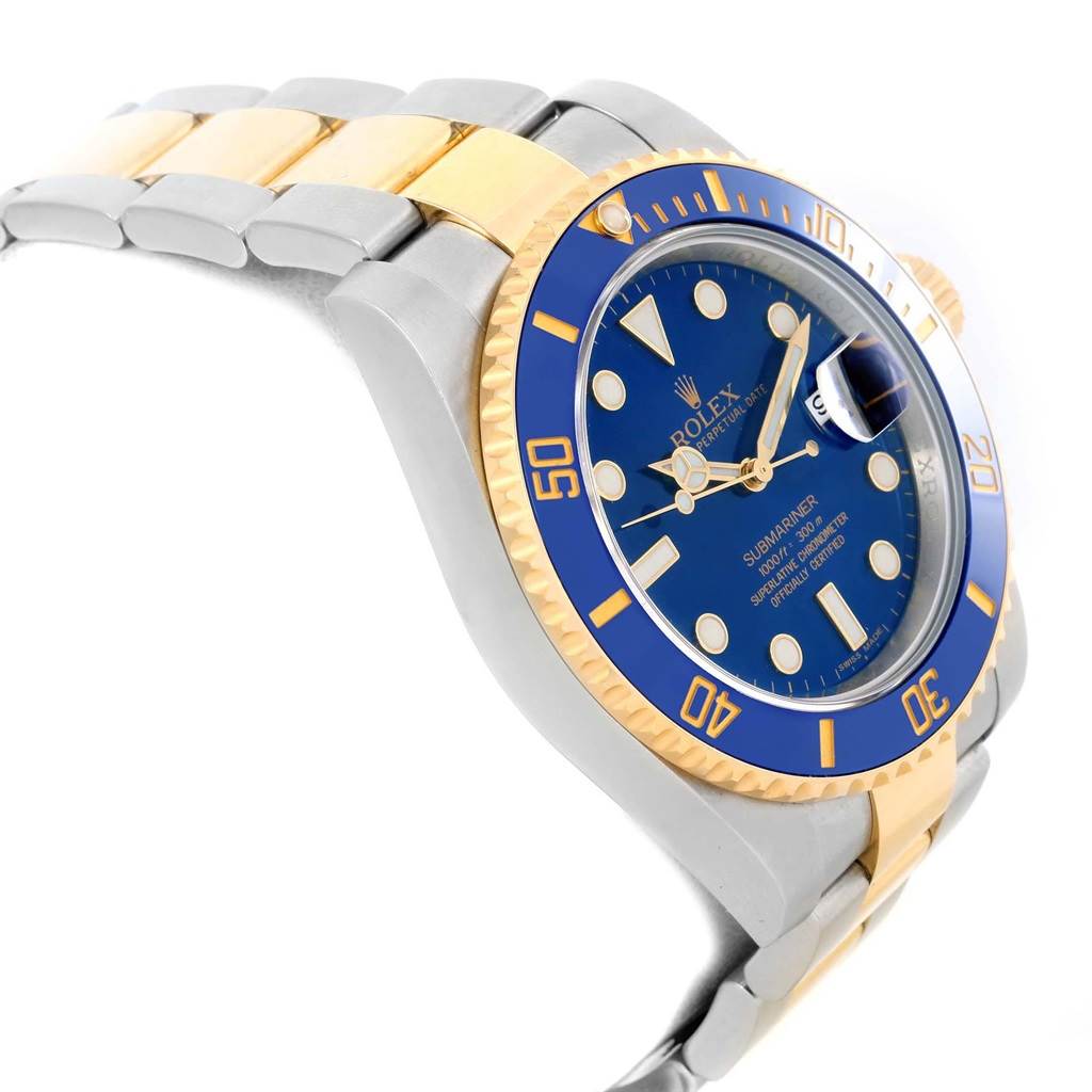 The image shows a Rolex Submariner 116613 Men's Steel and Gold (two tone) Blue Dial 116613 Men's Steel and Gold (two tone) Blue Dial watch angled to display its case, dial, bezel, and bracelet.