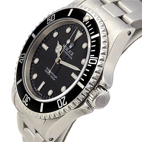 This angle shows the face, bezel, crown, and part of the bracelet of the Rolex Submariner 14060 Men's Stainless Steel Black Dial 14060 Men's Stainless Steel Black Dial watch.