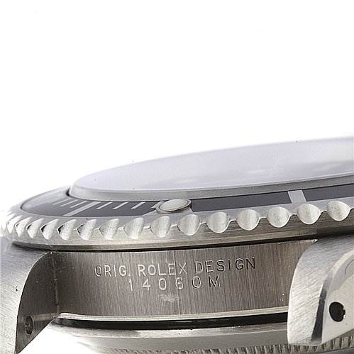 The image shows a close-up side view of a Rolex Submariner 14060 Men's Stainless Steel Black Dial 14060 Men's Stainless Steel Black Dial, highlighting the bezel, case, and part of the crystal.