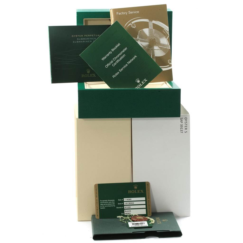 The image shows the packaging and booklets for a Rolex Submariner 114060 Men's Stainless Steel Black Dial 114060 Men's Stainless Steel Black Dial watch, including the warranty and service card.