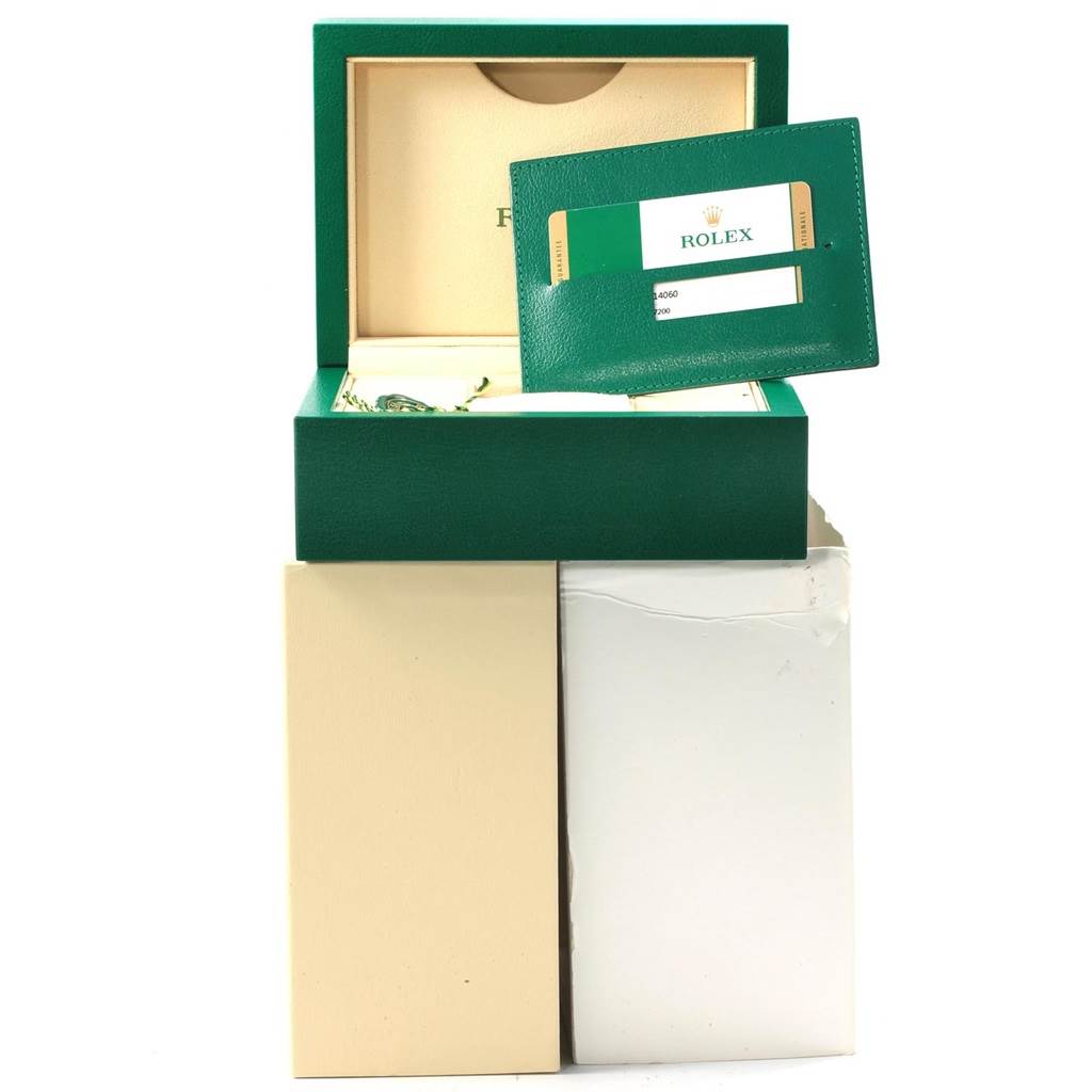 The image shows the box, warranty card, and packaging for a Rolex Submariner 114060 Men's Stainless Steel Black Dial 114060 Men's Stainless Steel Black Dial watch.