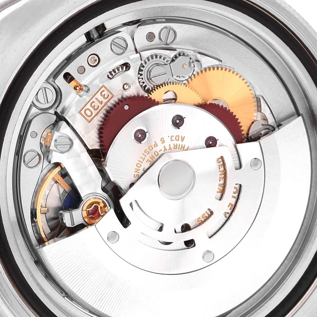 This is an angled close-up view of the movement mechanism inside the Rolex Submariner 114060 Men's Stainless Steel Black Dial 114060 Men's Stainless Steel Black Dial watch.