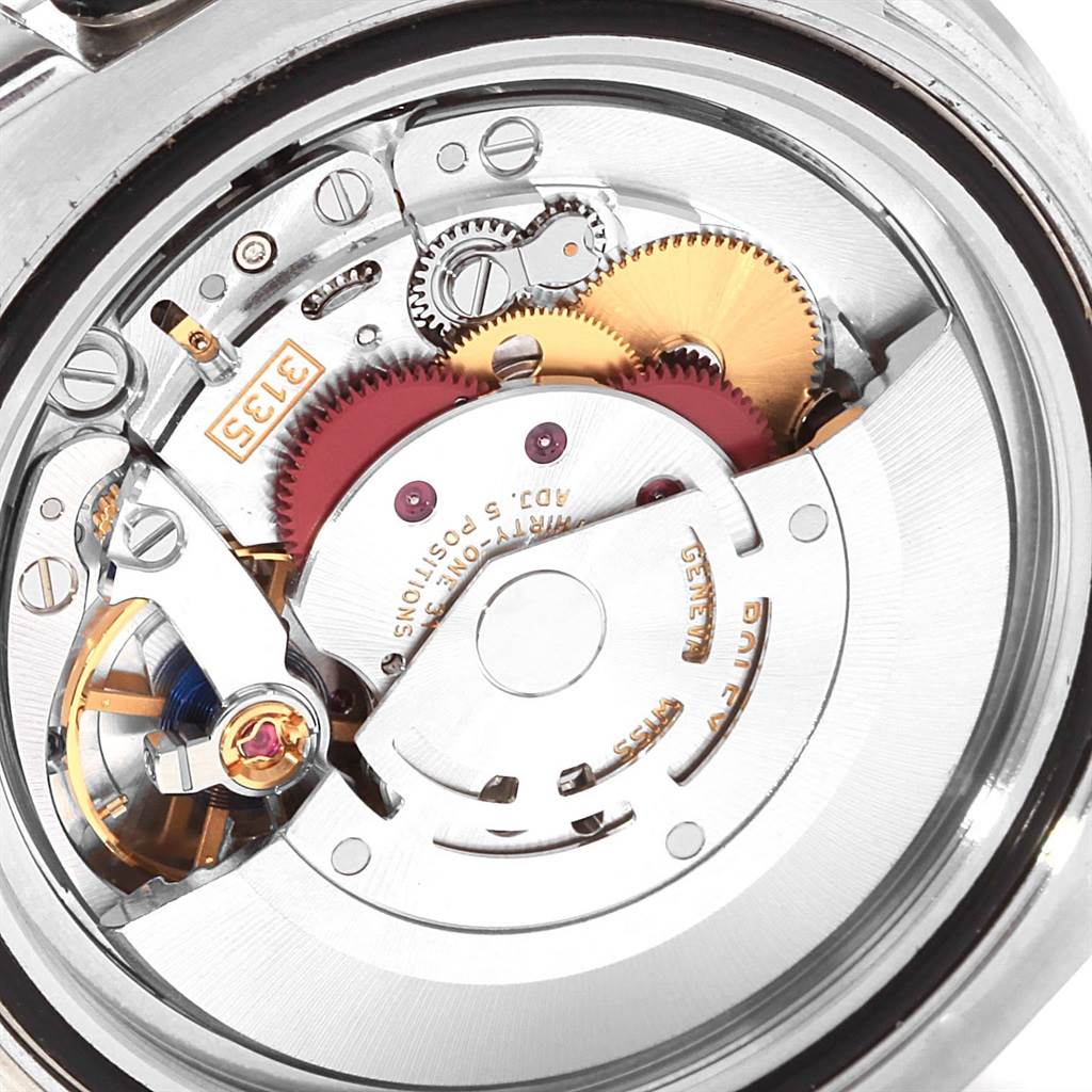 This image shows a detailed view of the movement mechanism of a Rolex Submariner 116610 Men's Stainless Steel Black Dial 116610 Men's Stainless Steel Black Dial watch from the back.