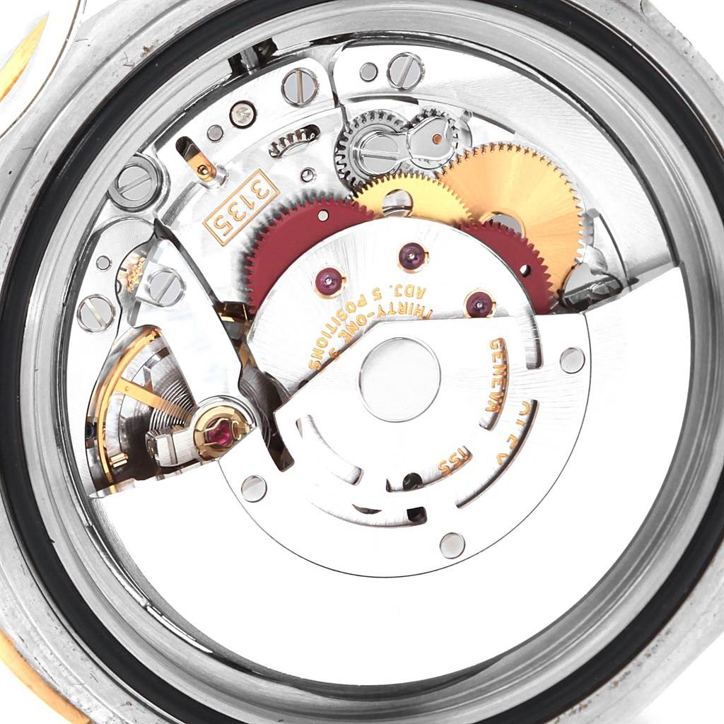 The image shows the internal mechanical movement of the Rolex Submariner 16613 Men's Steel and Gold (two tone) Blue Dial 16613 Men's Steel and Gold (two tone) Blue Dial watch viewed from the back.