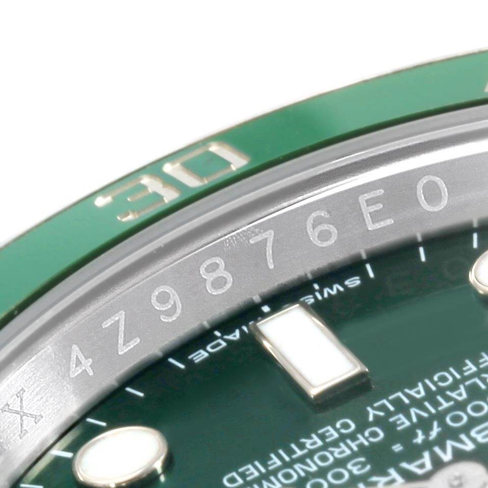 This close-up angle shows the green bezel, part of the dial, and the serial number of the Rolex Submariner 116610LV Men's Stainless Steel Green Dial 116610LV Men's Stainless Steel Green Dial.