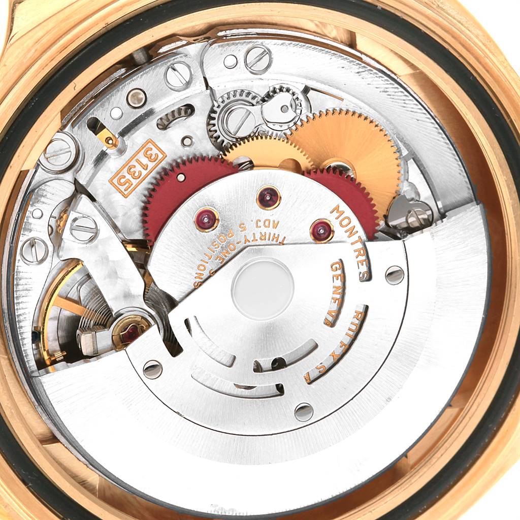 This image shows the internal movement mechanism of a Rolex Submariner 16618 Men's Yellow Gold Black Dial 16618 Men's Yellow Gold Black Dial watch, viewed from the case back.