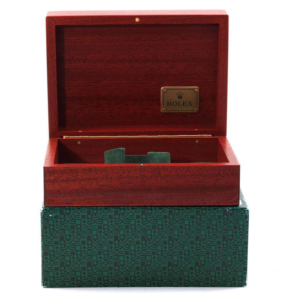 This image shows an open Rolex Submariner 16618 Men's Yellow Gold Black Dial 16618 Men's Yellow Gold Black Dial presentation box from a front angle, revealing its red wood and green cushion inside.