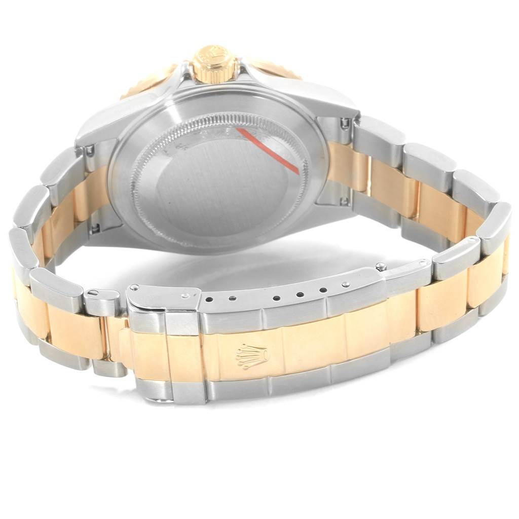 This image shows the back view of a Rolex Submariner 16613 Men's Steel and Gold (two tone) Grey Dial 16613 Men's Steel and Gold (two tone) Grey Dial watch, including the case back, bracelet, and clasp.