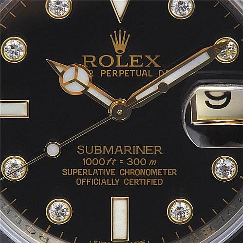 The image shows a close-up of the Rolex Submariner 116613 Men's Yellow Gold Black Dial 116613 Men's Yellow Gold Black Dial watch dial, featuring hour markers, hands, and part of the date window.