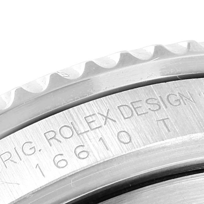 Close-up of the engraved bezel and case back edge of a Rolex Submariner 16610LV Men's Stainless Steel Black Dial 16610LV Men's Stainless Steel Black Dial watch, displaying the model number 16610.