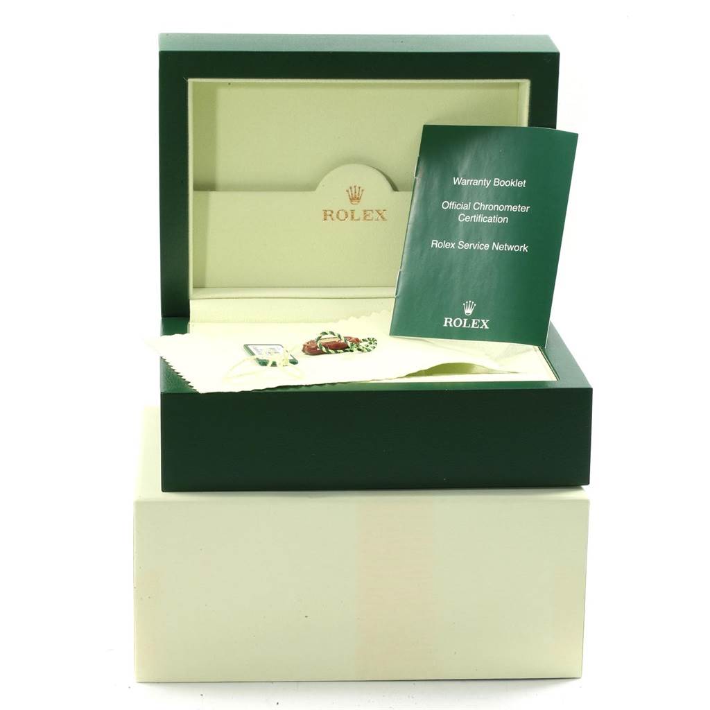 The image shows the box, warranty booklet, official chronometer certification, and service network booklet for a Rolex Submariner 16610LV Men's Stainless Steel Black Dial 16610LV Men's Stainless Steel Black Dial watch.