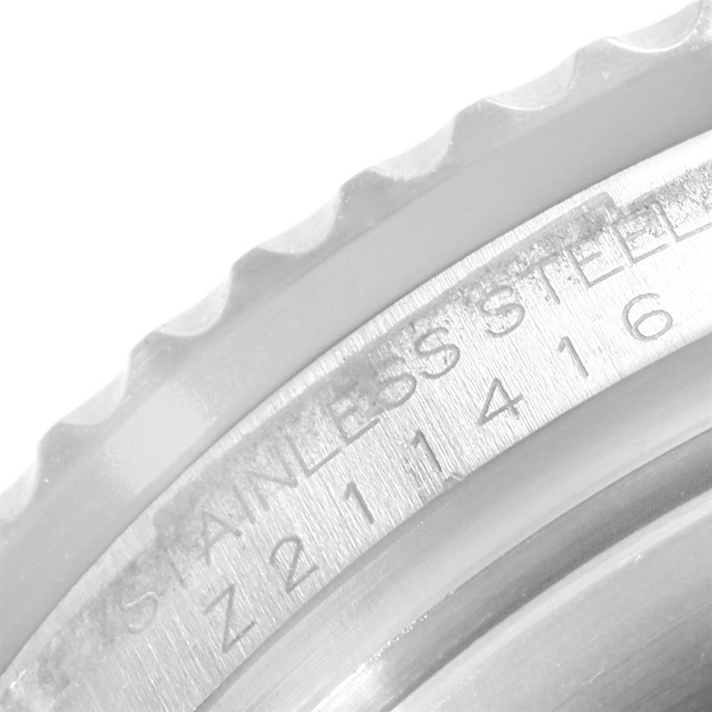 This close-up image shows the edge and part of the engraved case back of a Rolex Submariner 16610LV Men's Stainless Steel Black Dial 16610LV Men's Stainless Steel Black Dial watch.