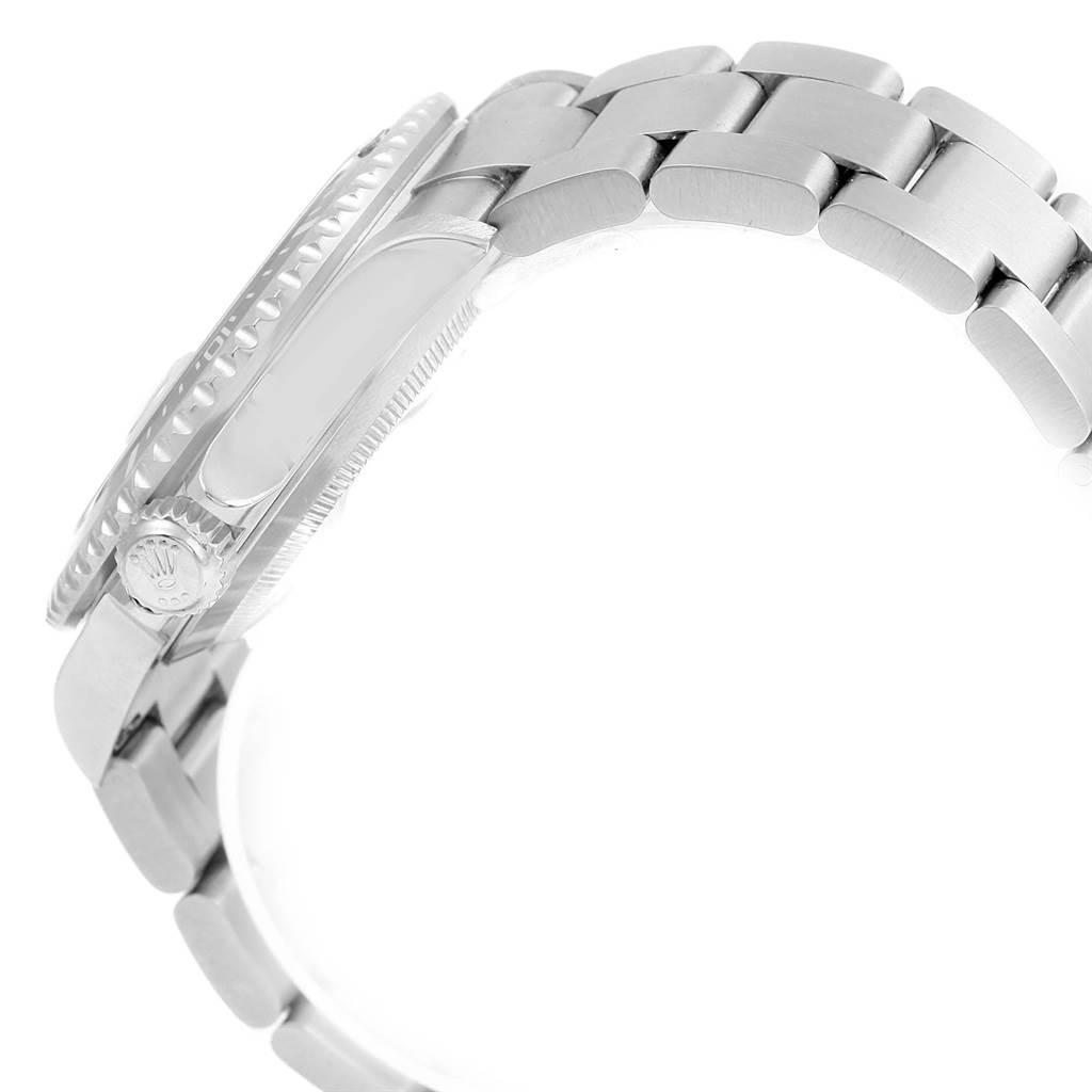 The image shows a side profile of a Rolex Submariner 16610 Men
s Stainless Steel Black Dial 16610 Men
s Stainless Steel Black Dial; visible parts include the bezel, crown, and part of the metal bracelet.