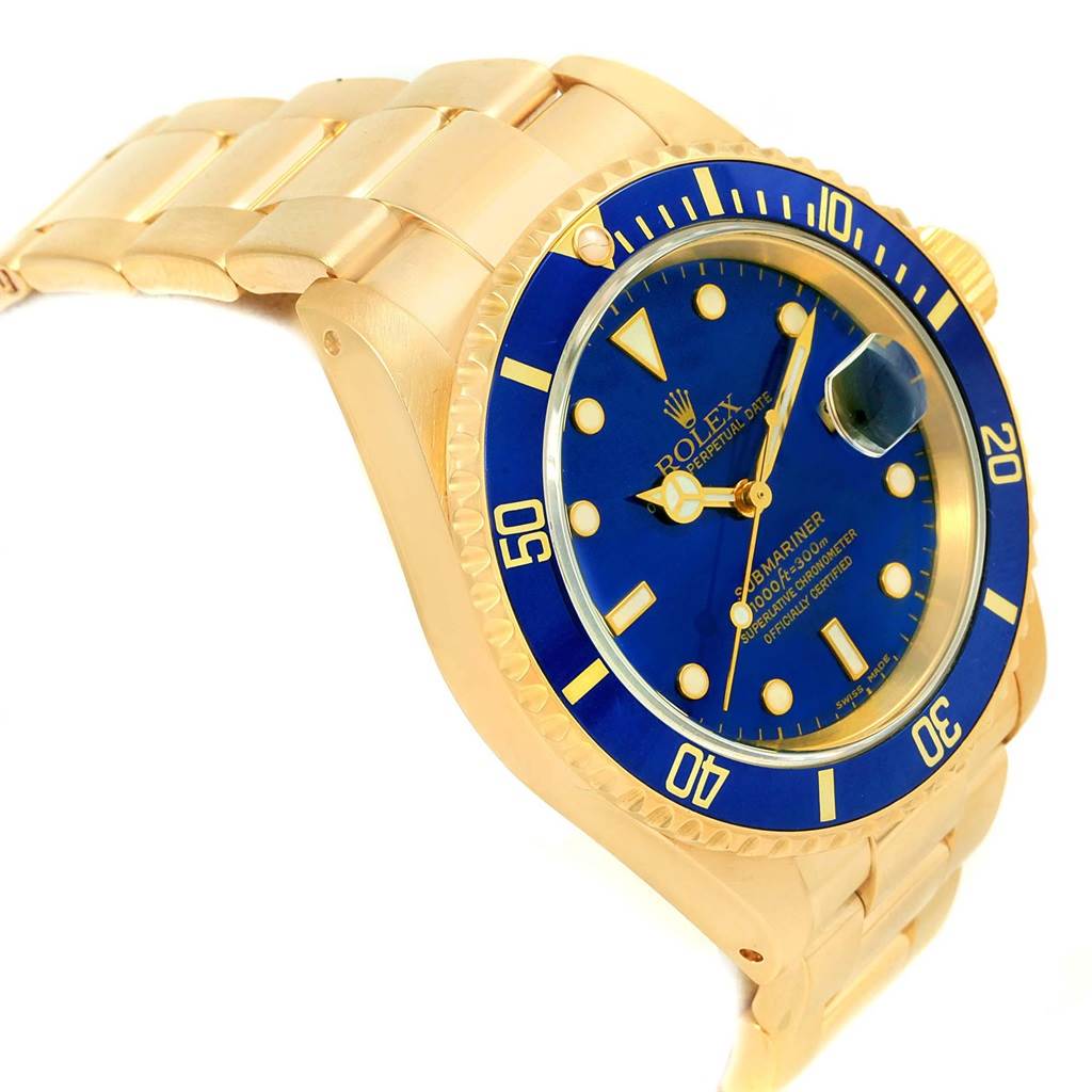 This image shows the side angle of the Rolex Submariner 16618 Men's Yellow Gold Blue Dial 16618 Men's Yellow Gold Blue Dial watch, highlighting its blue dial, bezel, and gold bracelet.