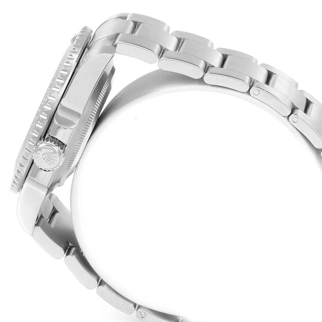 The image shows a side view of a Rolex Submariner 114060 Men's Stainless Steel Black Dial 114060 Men's Stainless Steel Black Dial watch, highlighting the crown and part of the bracelet.