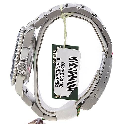 This image shows a side view of a Rolex Submariner 16610LV Men's Stainless Steel Black Dial 16610LV Men's Stainless Steel Black Dial watch, highlighting the bracelet, crown, and a reference tag.