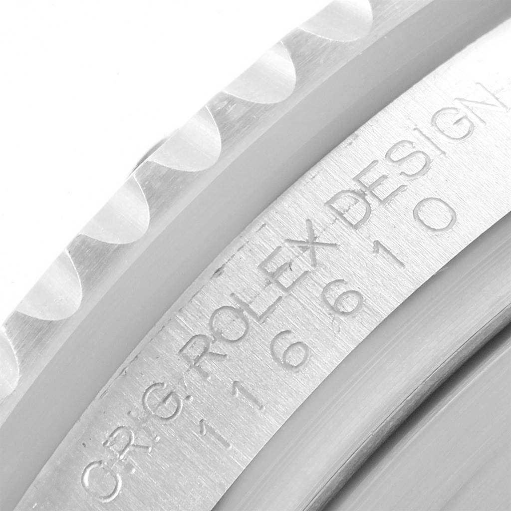 The image shows a close-up of the engraved side of the bezel and case of a Rolex Submariner 116610 Men's Stainless Steel Black Dial 116610 Men's Stainless Steel Black Dial watch.