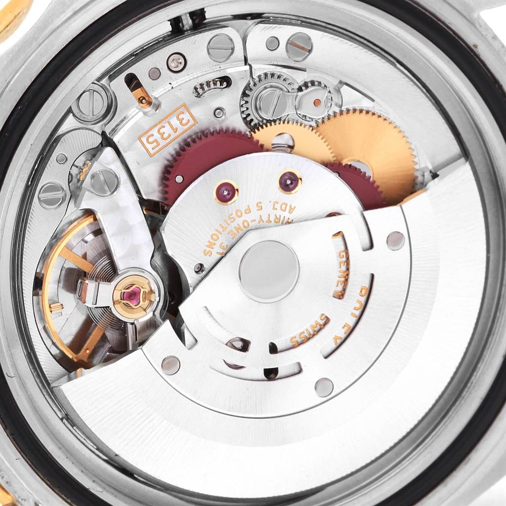 This image shows the internal mechanical movement of the Rolex Submariner 16613 Men's Steel and Gold (two tone) Black Dial 16613 Men's Steel and Gold (two tone) Black Dial watch from a close-up, top-down angle.