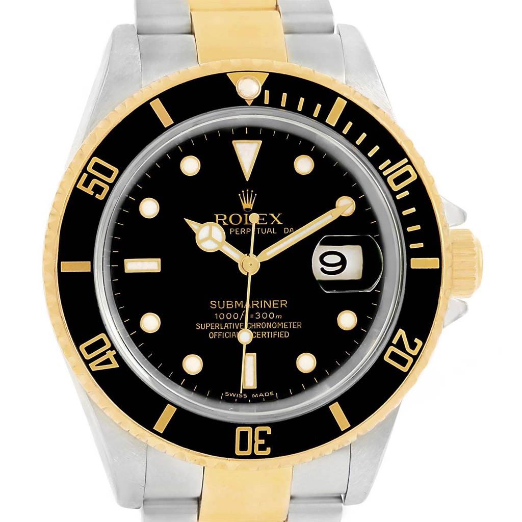 The image shows a Rolex Submariner 16613 Men's Steel and Gold (two tone) Black Dial 16613 Men's Steel and Gold (two tone) Black Dial watch at a front angle, highlighting its black dial, date display, and gold bezel.