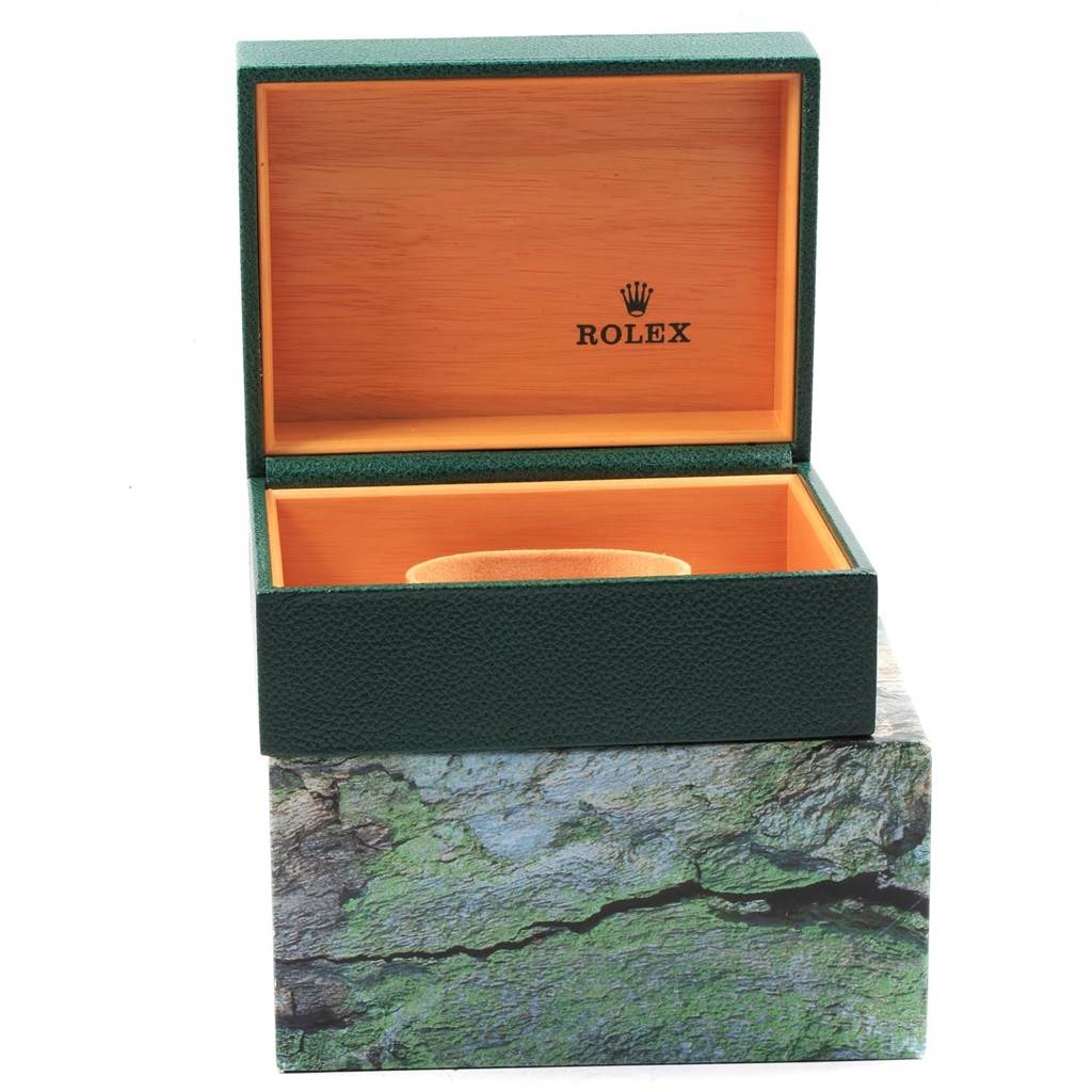 The image shows an open green and wooden watch box for the Rolex Submariner 16610 Men's Stainless Steel Black Dial 16610 Men's Stainless Steel Black Dial model, with the Rolex logo inside the lid.