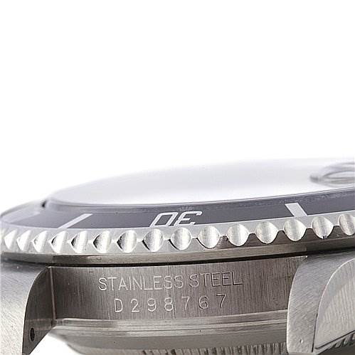 The image shows a side angle of the Rolex Submariner 16610 Men's Stainless Steel Black Dial 16610 Men's Stainless Steel Black Dial watch, highlighting its stainless steel case, bezel, and part of the serial number.