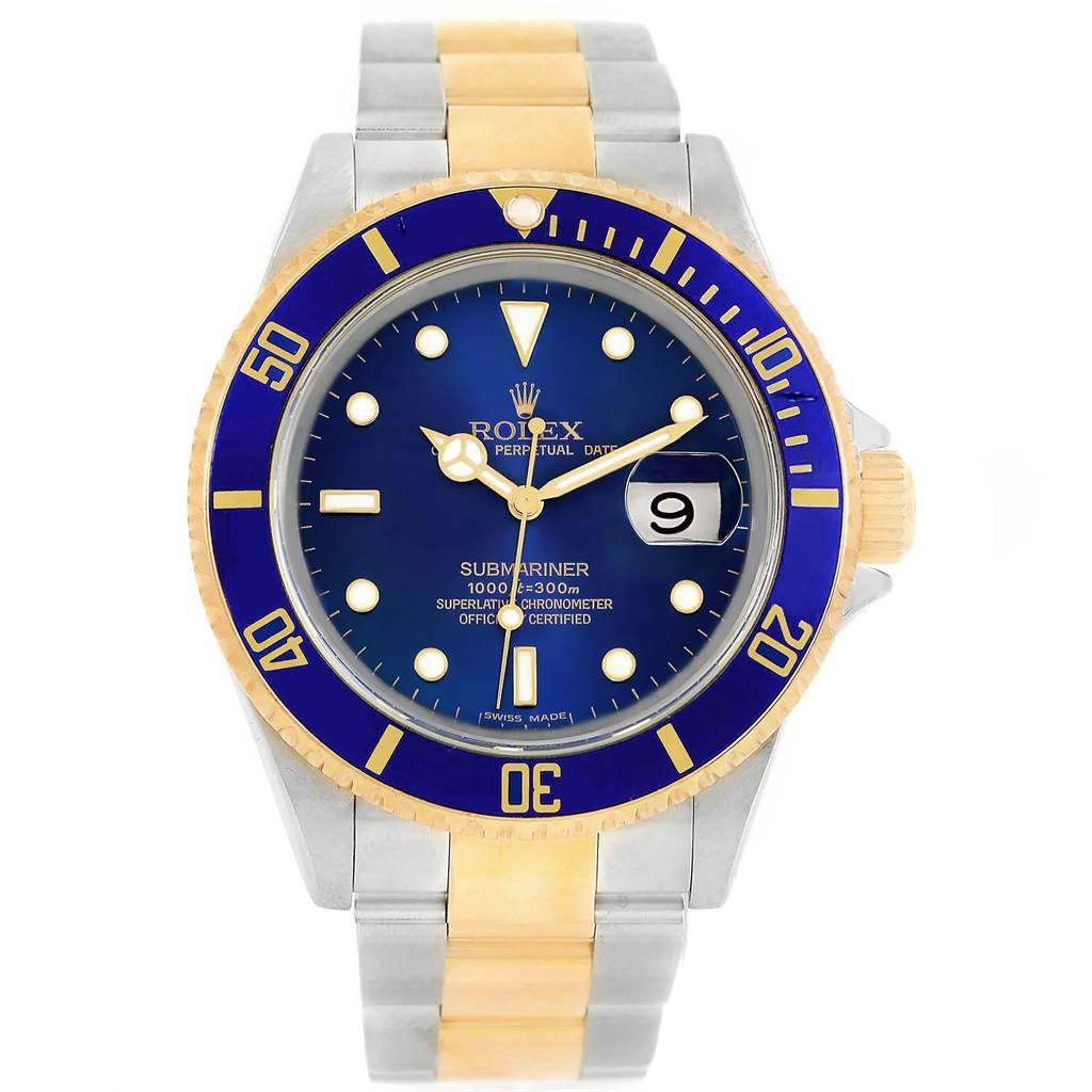 This Rolex Submariner 16613 Men's Steel and Gold (two tone) Blue Dial 16613 Men's Steel and Gold (two tone) Blue Dial watch is shown from a front angle, displaying its blue dial, date window, and two-tone bracelet.