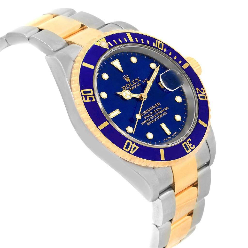 This image shows a close-up side angle of a Rolex Submariner 16613 Men's Steel and Gold (two tone) Blue Dial 16613 Men's Steel and Gold (two tone) Blue Dial watch, highlighting its blue dial, bezel, and two-tone bracelet.