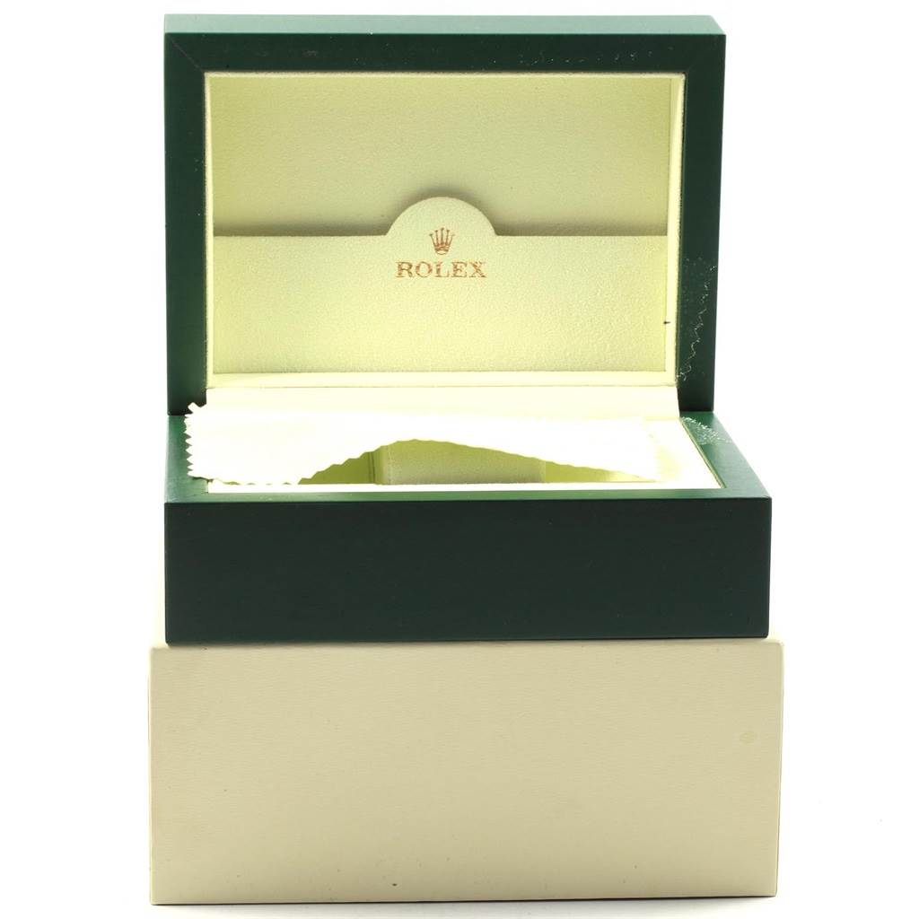 The image shows an open green Rolex Submariner 16613 Men's Steel and Gold (two tone) Blue Dial 16613 Men's Steel and Gold (two tone) Blue Dial watch box with no watch inside.