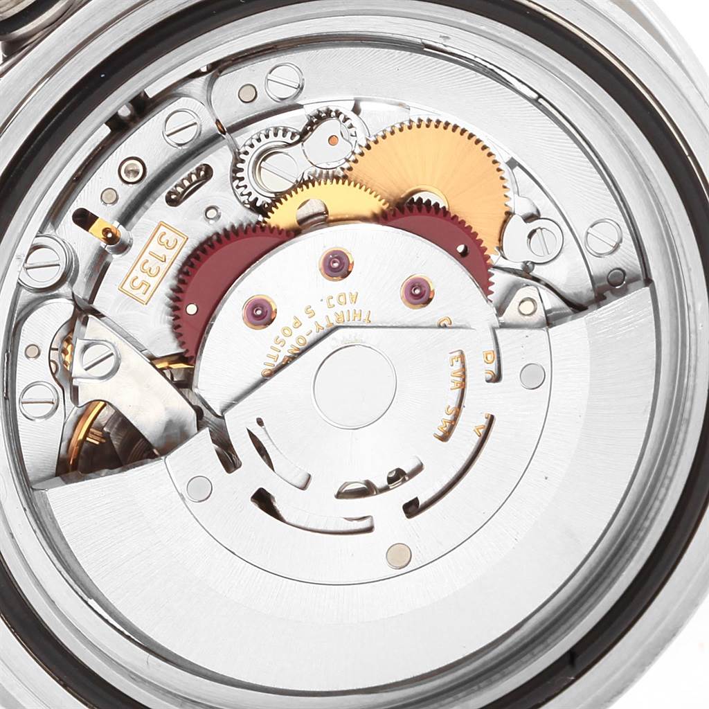 This image shows a close-up view of the internal movement mechanism of a Rolex Submariner 16610LV Men's Stainless Steel Black Dial 16610LV Men's Stainless Steel Black Dial watch.