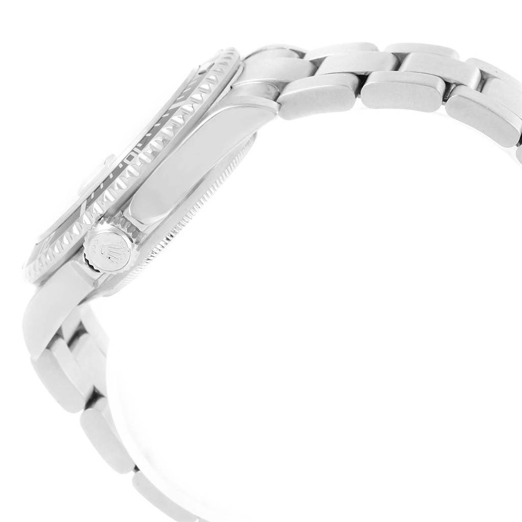 The image shows a side view of a Rolex Submariner 16610 Men's Stainless Steel Black Dial 16610 Men's Stainless Steel Black Dial, highlighting the bezel, crown, and part of the bracelet with links.