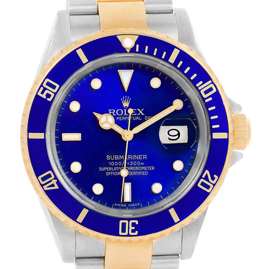 This image shows a front view of the Rolex Submariner 16613 Men's Steel and Gold (two tone) Blue Dial 16613 Men's Steel and Gold (two tone) Blue Dial watch, highlighting its blue dial, bezel, gold accents, and date indicator.